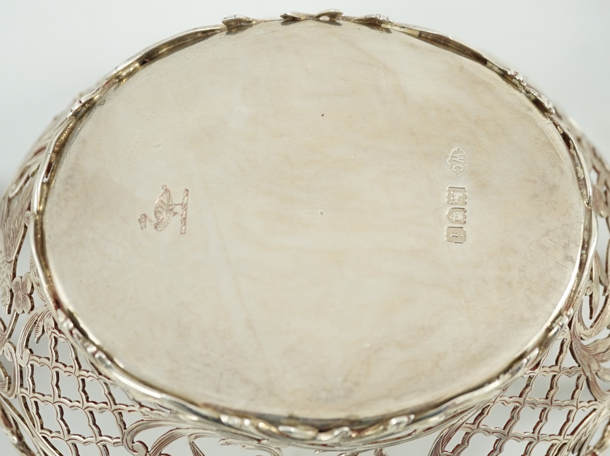 A pair of Edwardian pierced silver two handled bon bon dishes, by William Comyns